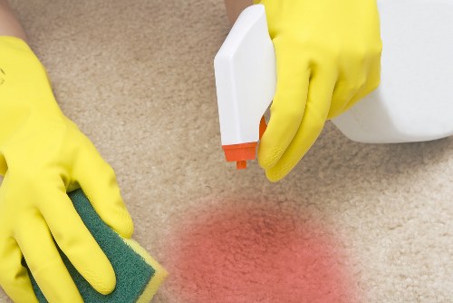 Local home cleaner preparing a tidy living room in Barnet