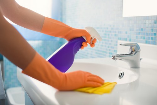 Cleaner preparing a Barnet property for a regular home cleaning visit